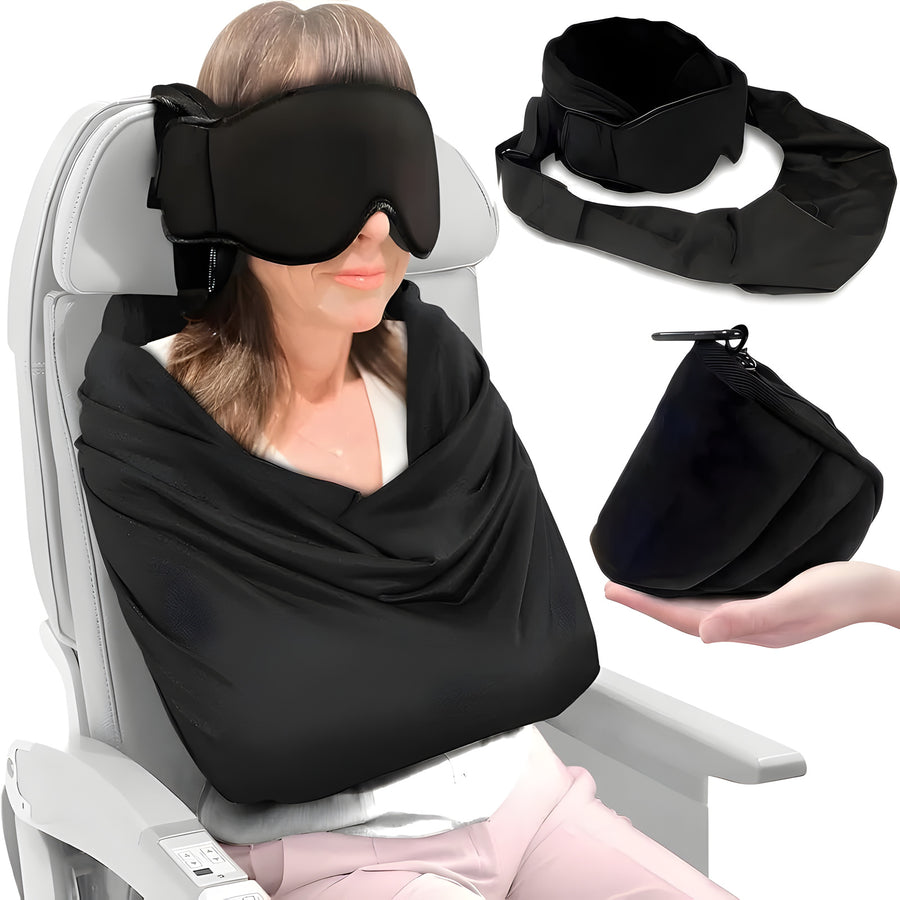 A traveler in a seat wearing the eye mask on the head pillow with the body sling draped over her, beside the three pieces and the travel pouch in a hand