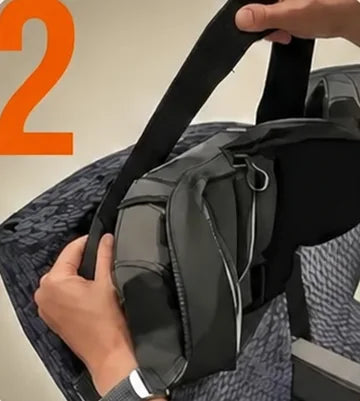 A hand slipping the strap behind the seat headrest